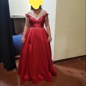 Red pageant dress. Size 12. Pictures do not do it justice.
